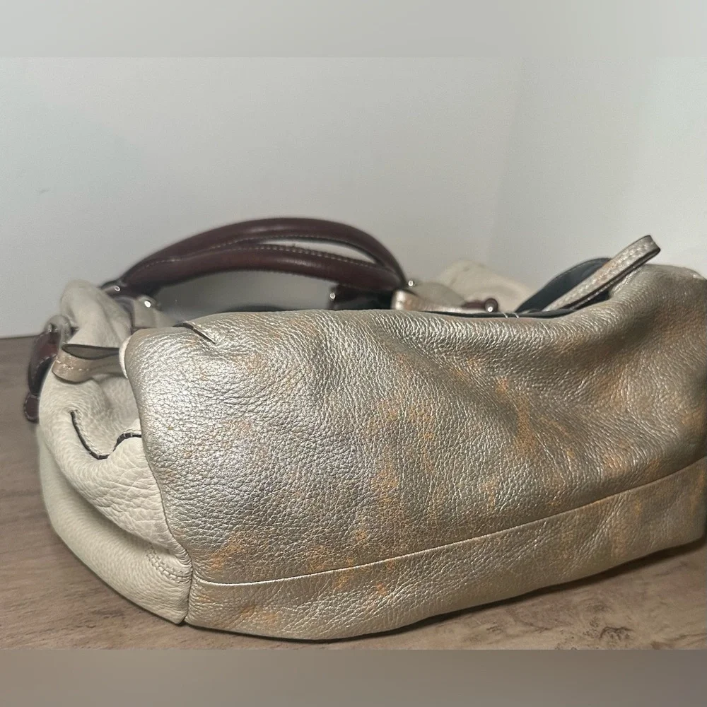 B. Makowsky Cream, Black, & Metallic‎ Pebbled Leather Hobo Bag.